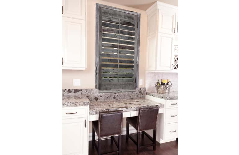 Reclaimed wood shutters on kitchen window in Minneapolis